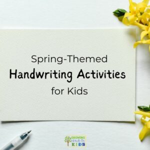 A white piece of paper laying on a flat surface with a pen in the bottom left corner. Yellow spring flowers are laying on the right side of the photo. Black text in the middle says "Spring-Themed Handwriting Activities for Kids".